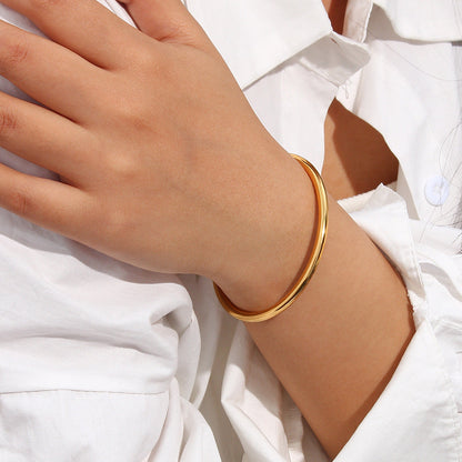 Alicia - Gold Bangle — bringing modern charm to your space.