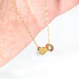 Mallory - Love Initial Letter Necklace — bringing modern charm to your space.