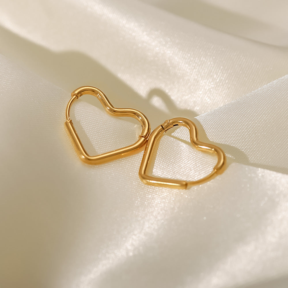 Clarissa - Heart Hoop Earrings — bringing modern charm to your space.