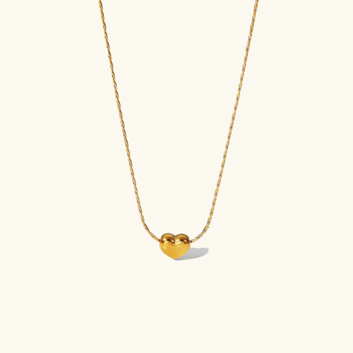 Collier Irene - Cœur en or — apporte une touche de charme moderne à votre espace.