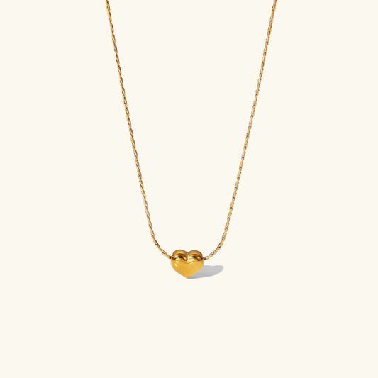 Irene - Gold Heart Necklace — bringing modern charm to your space.
