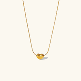Irene - Gold Heart Necklace — bringing modern charm to your space.