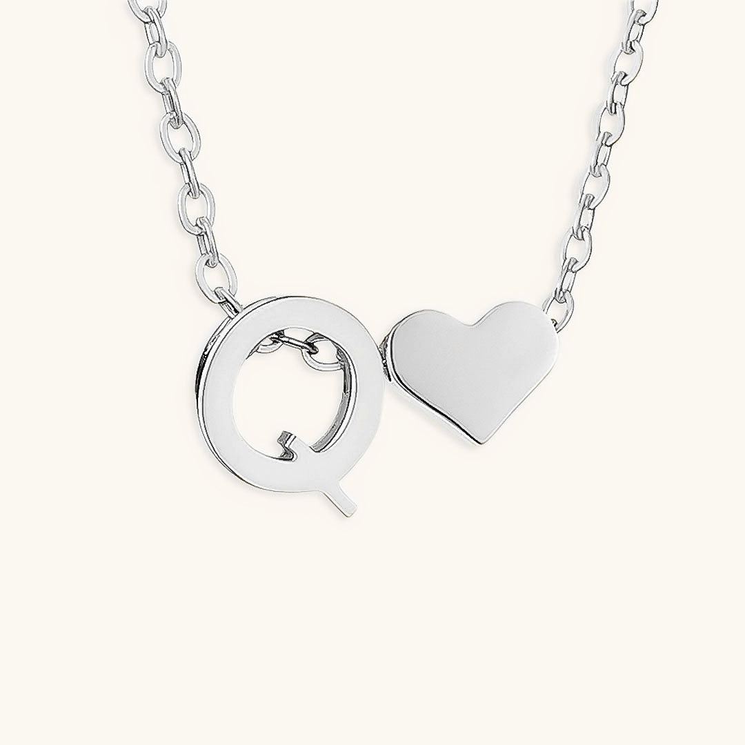 Mallory - Love Initial Letter Necklace — bringing modern charm to your space.