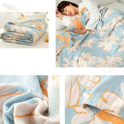 Couverture douce en coton à motif marguerites pour une décoration et un confort estivaux à la maison.