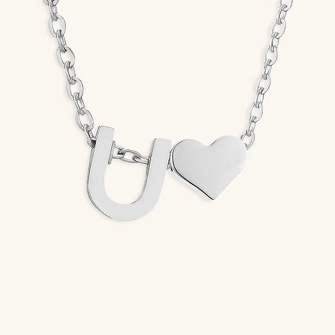 Mallory - Love Initial Letter Necklace — bringing modern charm to your space.