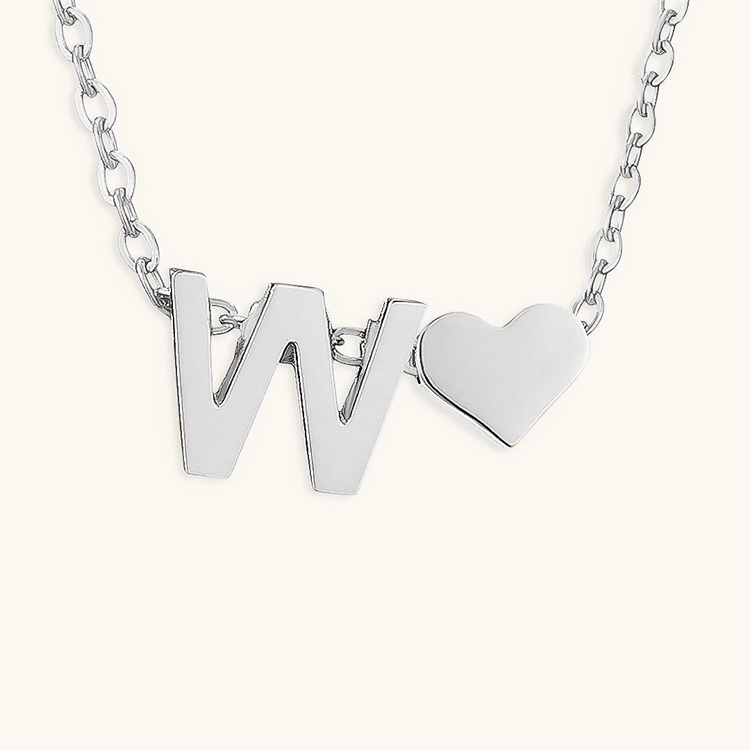 Mallory - Love Initial Letter Necklace — bringing modern charm to your space.