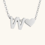 Mallory - Love Initial Letter Necklace — bringing modern charm to your space.