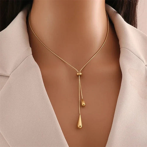 Ismara - Adjustable Pull Droplet Necklace & Earrings — designed to inspire your lifestyle.