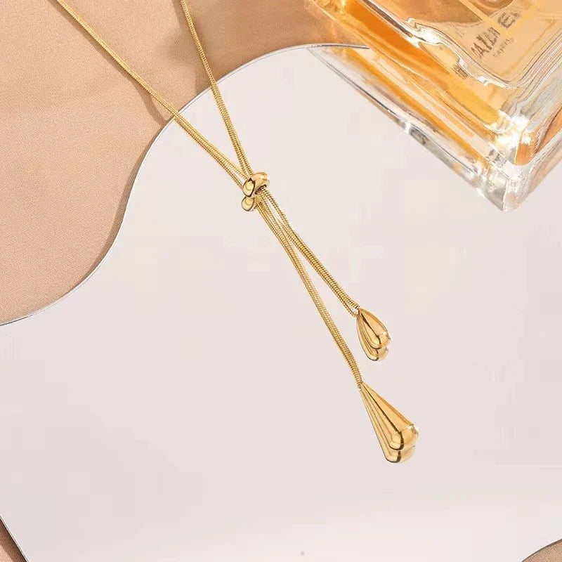 Ismara - Adjustable Pull Droplet Necklace & Earrings — designed to inspire your lifestyle.
