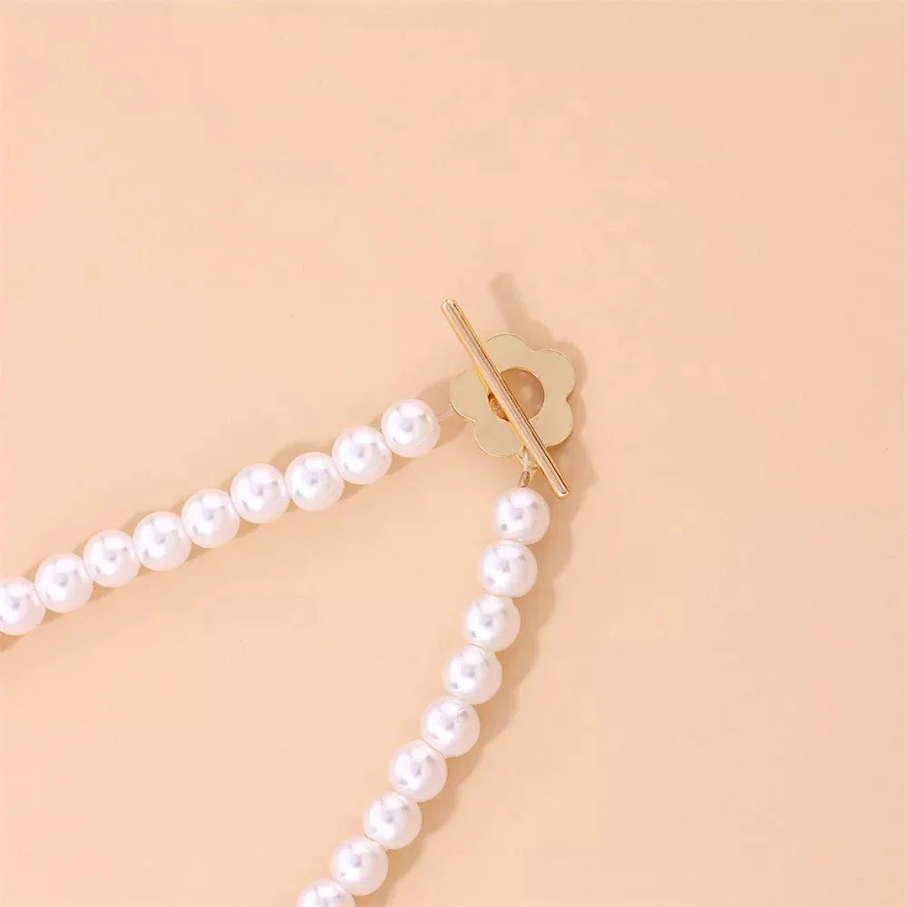 Elora - Flower Clasp Choker Necklace White — made with care and attention to detail.
