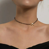 Elora - Flower Clasp Choker Necklace Black — crafted for everyday quality.