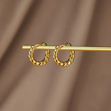 Madeline - Gold Twist Earrings — designed to inspire your lifestyle.