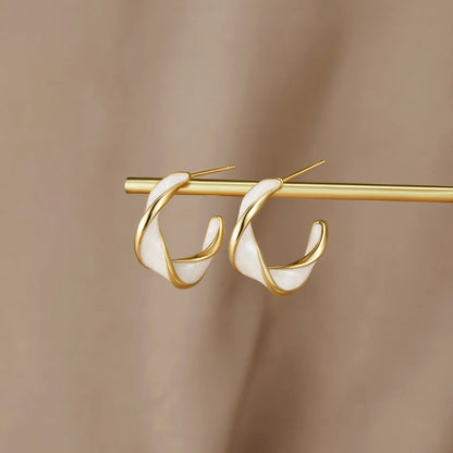 Zoe - Pearl Twist Hoop Earrings — made with care and attention to detail.