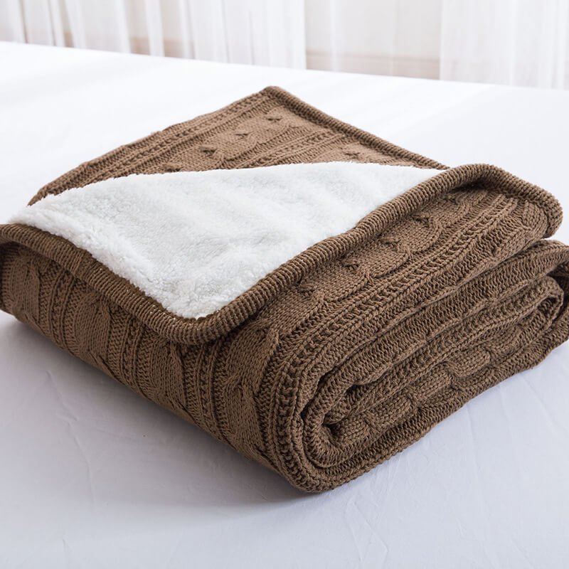 Couverture en laine sherpa à grosse maille douce pour une décoration intérieure confortable