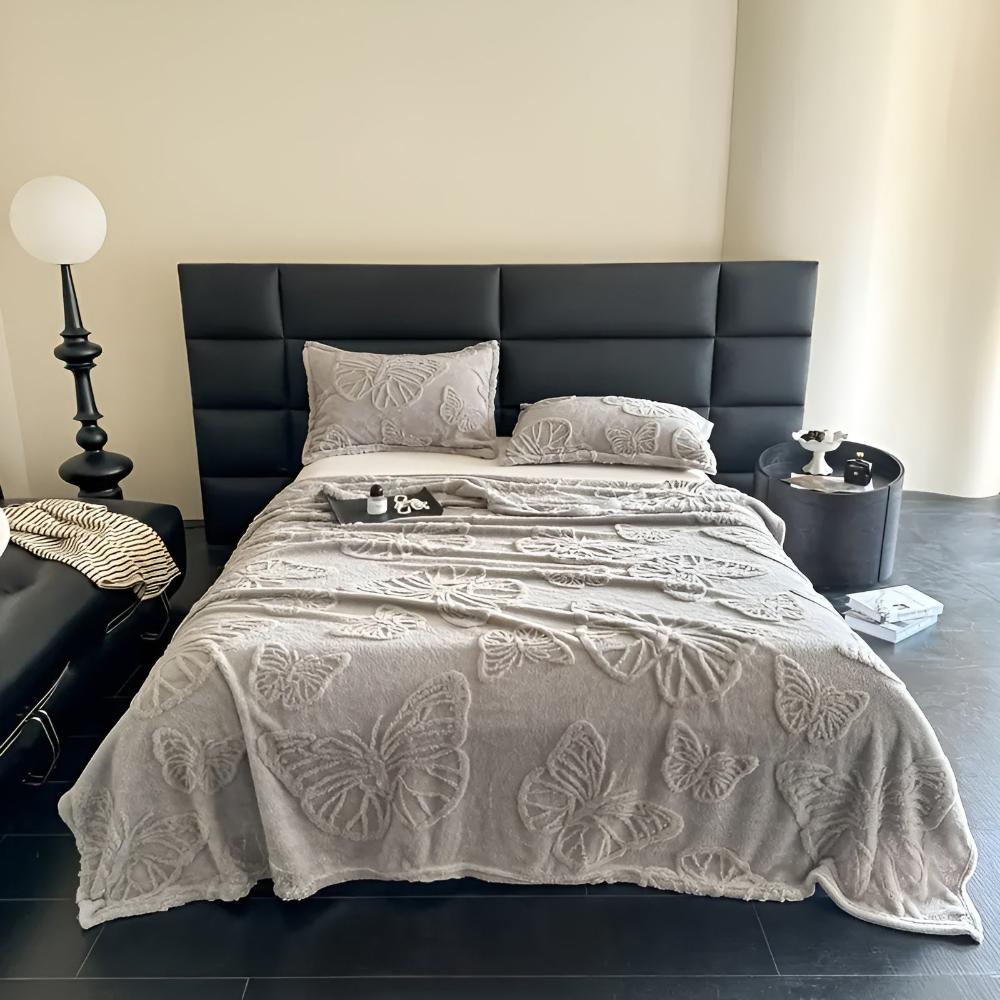 Plaid en flanelle jacquard douce à papillons pour une décoration intérieure chaleureuse