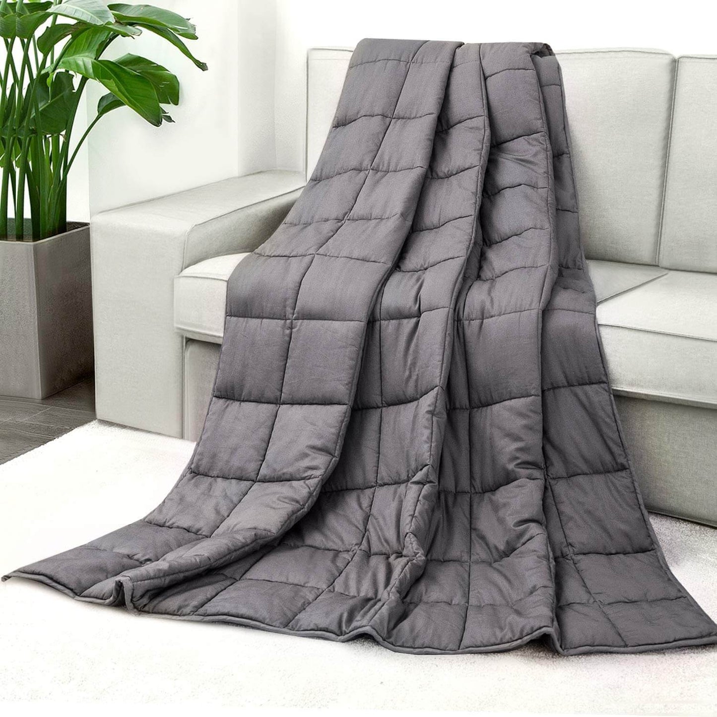 Couverture lestée gris foncé avec du coton doux et des billes de verre pour un sommeil réparateur