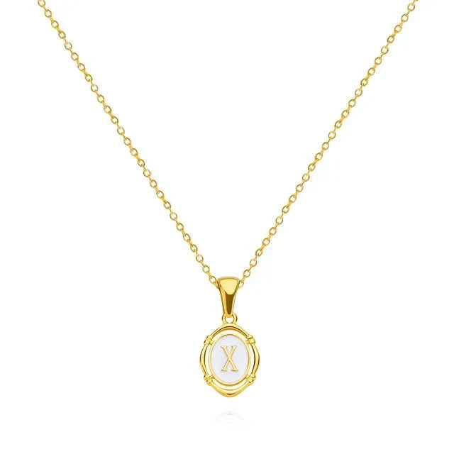 Trinity - Vintage Gold Letter Necklace — made with care and attention to detail.